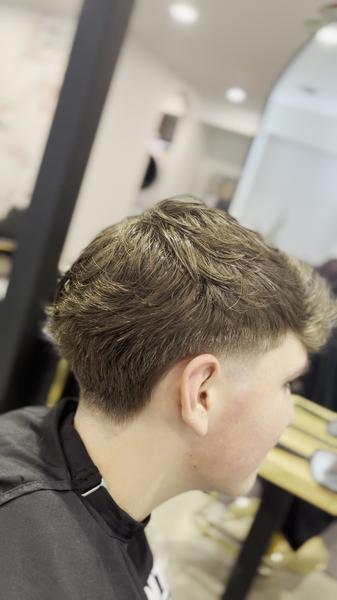 Classic men's taper haircut with clean lines by Kobe Popek